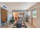 Cozy living room featuring tile floors and a pass-through to another room at 3515 18Th E St, Bradenton, FL 34208