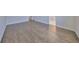 A bright bedroom boasts hardwood floors and white trim, creating a clean and modern aesthetic at 3913 W Euclid Ave, Tampa, FL 33629