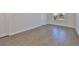 Bright bedroom offers hardwood floors, recessed lighting, and an en suite, ideal for comfort and relaxation at 3913 W Euclid Ave, Tampa, FL 33629