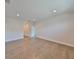 Large bedroom featuring hardwood floors, neutral walls, and recessed lighting, creating a comfortable and inviting atmosphere at 3913 W Euclid Ave, Tampa, FL 33629