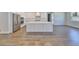 Modern kitchen with stainless steel appliances and a center island with countertop seating at 3913 W Euclid Ave, Tampa, FL 33629