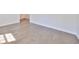 Bright room featuring light wood floors and base trim at 3913 W Euclid Ave, Tampa, FL 33629