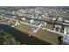 Gorgeous waterfront home with private dock, surrounded by expansive lawn and easy canal access at 4010 Jewfish Dr, Hernando Beach, FL 34607