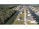 Majestic waterfront community featuring canal access to open water, nestled amidst verdant landscapes at 4010 Jewfish Dr, Hernando Beach, FL 34607