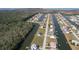 Stunning aerial view of waterfront community with canal access to open water and surrounding natural beauty at 4010 Jewfish Dr, Hernando Beach, FL 34607