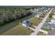 Aerial shot of waterfront home with lush green lawn and boat dock at 4010 Jewfish Dr, Hernando Beach, FL 34607