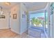Bright entryway opens onto a porch area with palm tree views at 4010 Jewfish Dr, Hernando Beach, FL 34607