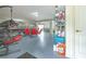 View of the garage showcasing storage, bikes, and a cozy seating area for relaxation and recreation at 4010 Jewfish Dr, Hernando Beach, FL 34607