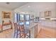 Spacious kitchen island with bar seating and stainless steel appliances at 4010 Jewfish Dr, Hernando Beach, FL 34607