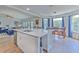 Kitchen featuring island with seating and stainless steel appliances at 4010 Jewfish Dr, Hernando Beach, FL 34607