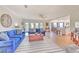 Spacious living room with hardwood floors, open layout, and bright natural light at 4010 Jewfish Dr, Hernando Beach, FL 34607