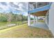 Covered patio area with canal access provides a great space for outdoor entertaining and relaxation at 4010 Jewfish Dr, Hernando Beach, FL 34607