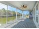 Enjoy outdoor living on this screened-in porch with views of the waterfront at 4010 Jewfish Dr, Hernando Beach, FL 34607