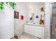 Well-lit bathroom featuring a white vanity, mirror, and decorative accents for a clean, inviting space at 4100 Ernest Dr, Wesley Chapel, FL 33543