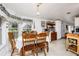 Charming breakfast nook with dining table, chairs, hutch and decorative accents at 4100 Ernest Dr, Wesley Chapel, FL 33543