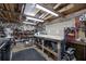 Organized workshop featuring workbenches, tools, and storage solutions for hobbyists or professionals at 4100 Ernest Dr, Wesley Chapel, FL 33543