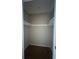 Walk-in closet with built in shelves at 455 Alt 19 S # 217, Palm Harbor, FL 34683