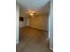 A sunny living area with tile floors, a ceiling fan, and windows that let in ample light at 455 Alt 19 S # 217, Palm Harbor, FL 34683