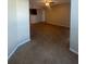 Bright open-concept living space with tile flooring and access to the kitchen at 455 Alt 19 S # 217, Palm Harbor, FL 34683