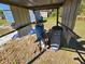 Close up image of a well pump and water tanks under the shed at 4905 Horton Rd, Plant City, FL 33567