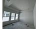 Bright bedroom features a trey ceiling and natural light from three windows at 7263 Kodiak Ln, Sarasota, FL 34240