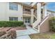 Inviting two-story condo building featuring well-maintained landscaping and multiple units at 7807 Hardwick Dr # 115, New Port Richey, FL 34653