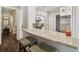 Kitchen with white cabinets, granite countertops and breakfast bar with seating at 808 Idlewood Ave, Tampa, FL 33609
