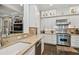 Kitchen with granite countertops, stainless steel appliances and white cabinetry at 808 Idlewood Ave, Tampa, FL 33609