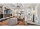 Comfortable living room with coffered ceilings, built-in shelving, and an open layout for seamless entertaining at 808 Idlewood Ave, Tampa, FL 33609