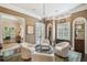 Sitting room with four chairs and an area rug at 808 Idlewood Ave, Tampa, FL 33609
