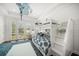 This stylish ' room features a bunk bed with drawers and a large window with a view to the backyard at 110 Harbor View Ln, Belleair Bluffs, FL 33770