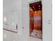 Elegant residential elevator featuring wood paneling and marble floors, offering convenience and luxury at 110 Harbor View Ln, Belleair Bluffs, FL 33770