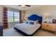 Serene bedroom featuring a plush bed, neutral decor, ambient lighting, and matching nightstands at 11091 Cotton Vale Pl, San Antonio, FL 33576