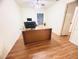 Bright office space with a large desk and natural light, perfect for working from home at 15013 Redcliff Dr, Tampa, FL 33625