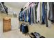 Walk-in closet with ample shelving and hanging space for organized storage, enhancing the functionality at 2253 Oakley Green Dr # 26, Sun City Center, FL 33573