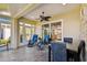 Spacious sunroom with seating and dining, perfect for relaxing and enjoying the view at 2253 Oakley Green Dr # 26, Sun City Center, FL 33573