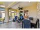 Spacious sunroom with seating and dining, perfect for relaxing and enjoying the view at 2253 Oakley Green Dr # 26, Sun City Center, FL 33573