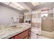 Functional bathroom featuring a vanity with sink, toilet, and a shower/bathtub combo, making it practical and convenient at 2457 Orangepointe Ave, Palm Harbor, FL 34683