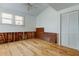 Spacious bedroom with hardwood floors, natural light, and closet at 2605 Pass A Grille Way, St Pete Beach, FL 33706