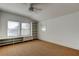 Bright bedroom with custom built-in shelving, storage, and two large windows for natural light at 2605 Pass A Grille Way, St Pete Beach, FL 33706