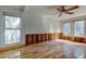 Living room with large windows providing plenty of natural light at 2605 Pass A Grille Way, St Pete Beach, FL 33706