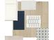 Selection of interior finishes including cabinets, countertop, flooring, and backsplash tiles at 28740 Jujube Rd, Wesley Chapel, FL 33543