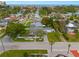 Aerial view of the neighborhood with lush greenery and well-maintained homes at 292 42Nd Ave, St Pete Beach, FL 33706