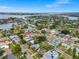 Aerial view of the neighborhood with lush greenery, waterways and ocean views at 292 42Nd Ave, St Pete Beach, FL 33706