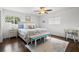 Comfortable bedroom featuring stylish decor, a queen-sized bed, and bright natural light at 292 42Nd Ave, St Pete Beach, FL 33706