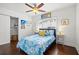 Bright bedroom featuring a closet, cozy bedding, and stylish beach-themed decor at 292 42Nd Ave, St Pete Beach, FL 33706