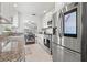 Modern kitchen with granite countertops, stainless steel appliances, and a bright, airy atmosphere at 292 42Nd Ave, St Pete Beach, FL 33706