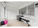 Bright sunroom with tile flooring, white walls, and plenty of natural light at 292 42Nd Ave, St Pete Beach, FL 33706