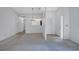 Bright living room with neutral carpet, chandelier, and lots of storage at 3210 Mcmath Dr, Palm Harbor, FL 34684