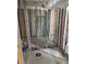 Bathroom interior displaying exposed framing, a window, and renovation potential for customization at 337 Rex Pl # B, Madeira Beach, FL 33708